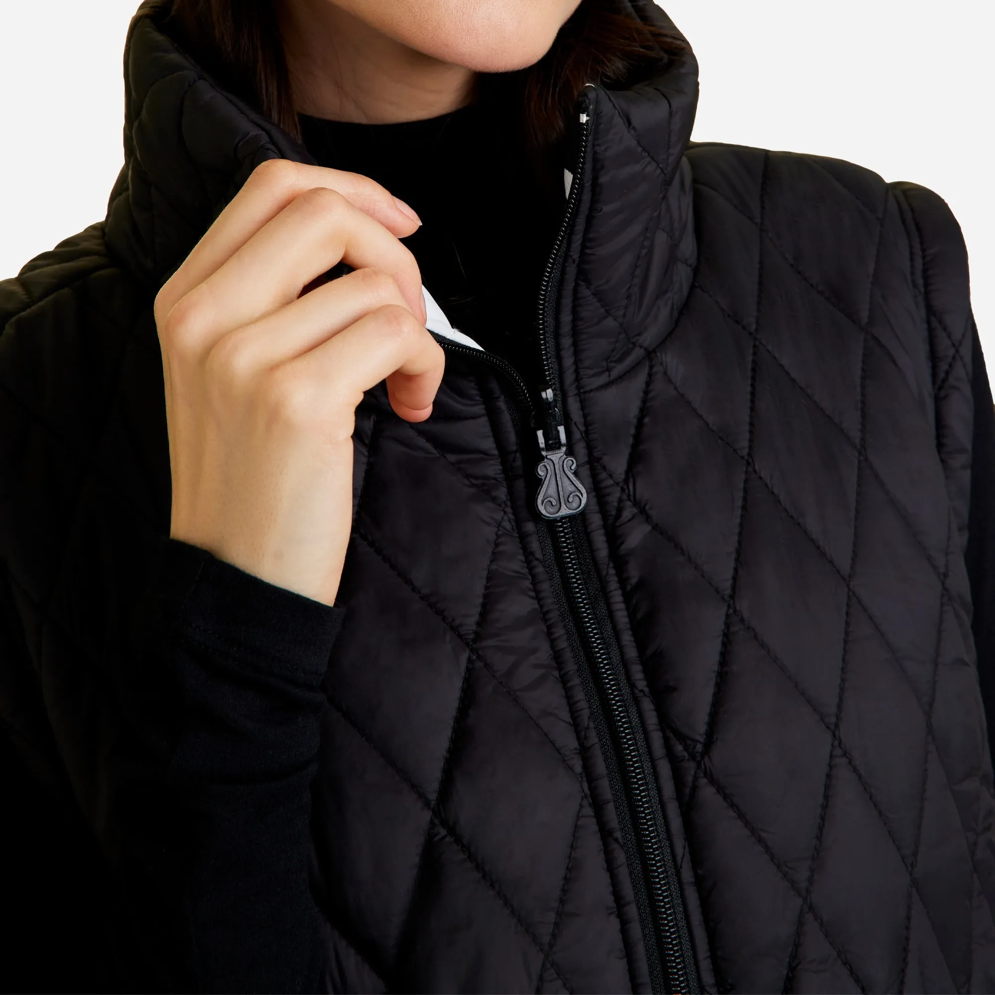 Alala® reversible puffer vest