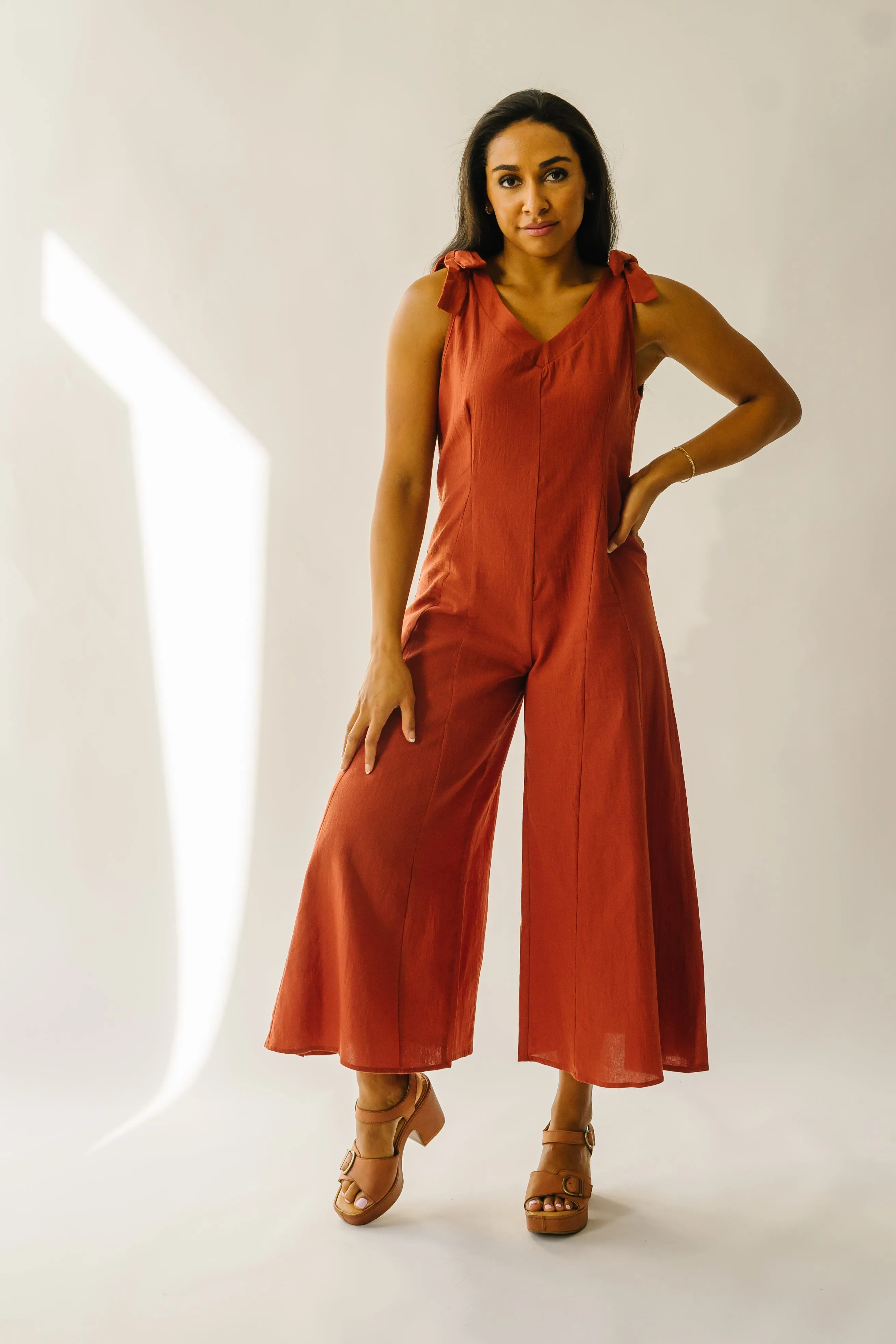 The Evannah Shoulder Tie Jumpsuit in Rust